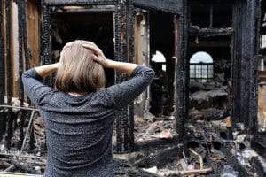 Fire-Damage-Woman-Stressed