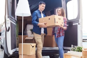 Young-Couple-Moving-Day-Moving-Boxes