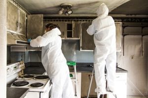 Meth Decontamination by guys dressed in hazmat suits