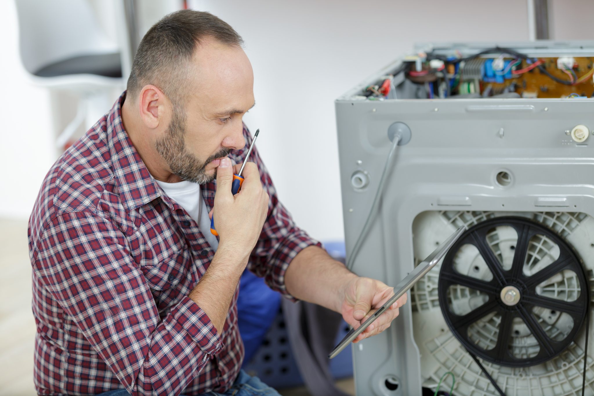 Water Leaking From Bottom of Washing Machine | Where to Look