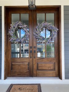 Wooden Front Door with Wreaths