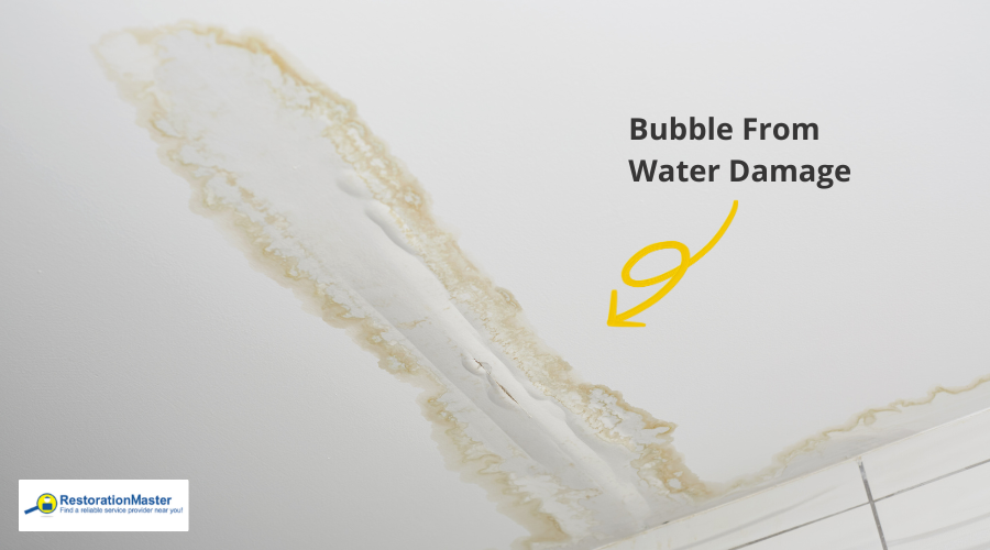 Water Bubble on Ceiling from Water Damage - RestorationMaster