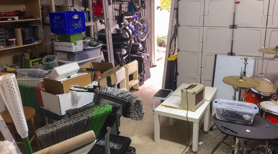 a garage filled and hoarded with unnecessary items