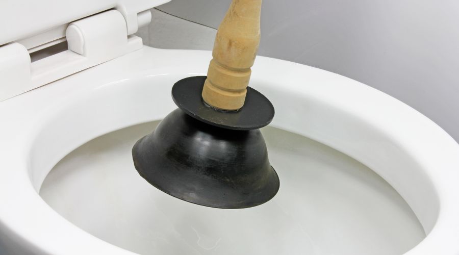 cleaning the blockages in the toilet