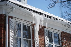 ice dam removal by RestorationMaster is needed for this home, damaged by an ice dam